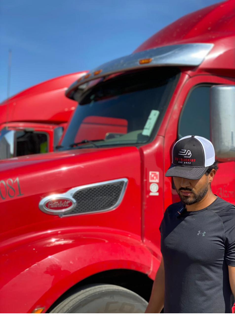 Big Trucking team member with Peterbilt truck