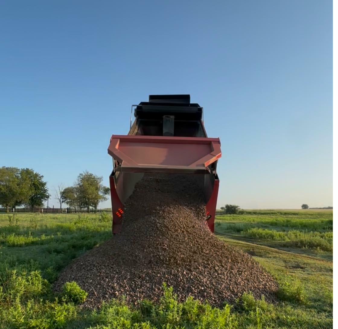 Dump truck material hauling